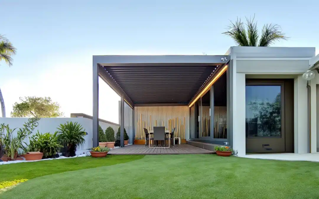 louvered pergola attached to a house
