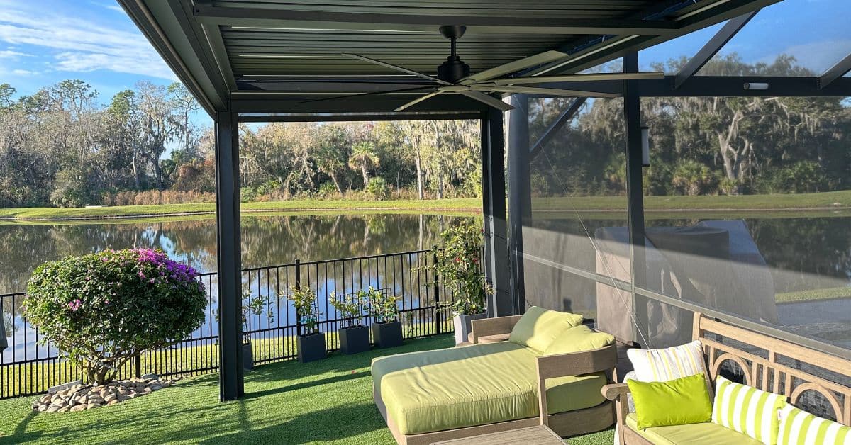 Aluminum Pergola With Adjustable Roof Panels - enVision Pergola Interior view of aluminum pergola with adjustable roof panels and ceiling fan